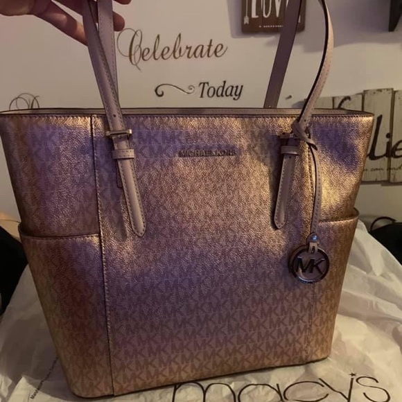 Michael Kors Metallic rose gold bag